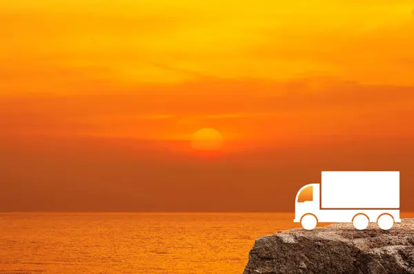 Truck icon on rock mountain over sunset sky and sea, Business transportation service concept