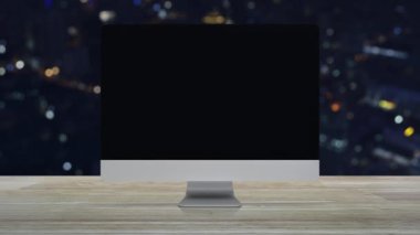 Power button icon on desktop modern computer monitor screen on wooden table over blur colorful night light city tower and skyscraper, Business start up online concept