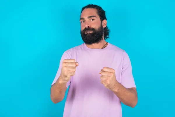 Displeased Annoyed Caucasian Man Beard Wearing Violet Shirt Blue Background — स्टॉक फ़ोटो, इमेज