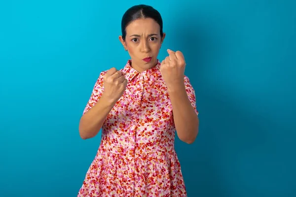 Displeased Annoyed Woman Wearing Floral Dress Clenches Fists Gestures Pissed — Fotografia de Stock