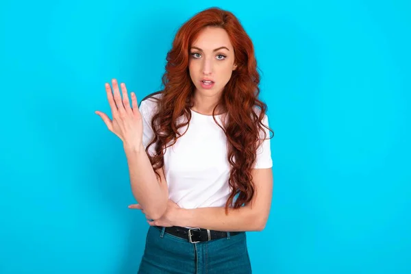 Studio Shot Frustrated Redhead Woman Wearing White Shirt Blue Background — Stockfoto