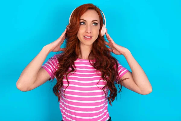 Joyful Redhead Woman Wearing Pink Striped Shirt Blue Background Sings — Stock Photo, Image