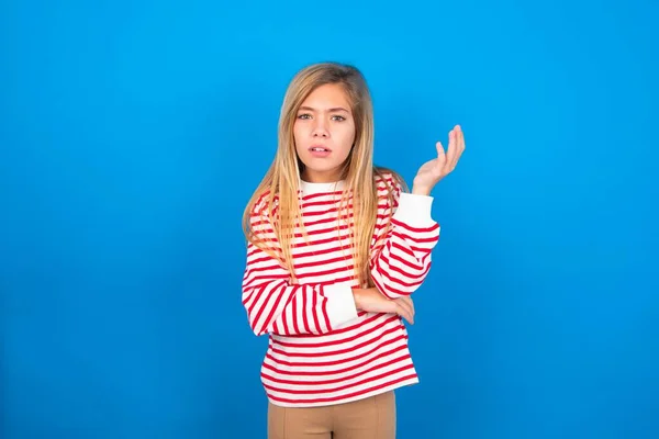 Studio Shot Frustrated Teen Girl Wearing Striped Shirt Blue Background — 图库照片
