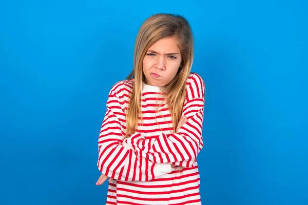 Picture Angry Teen Girl Wearing Striped Shirt Blue Background Crossing — Stock Photo, Image