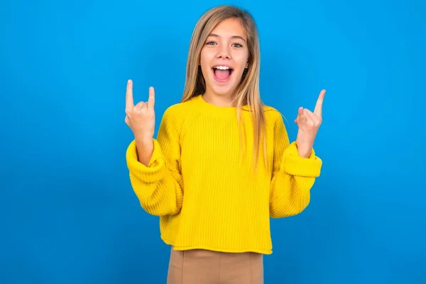 Happy Caucasian Teen Girl Wearing Yellow Sweater Blue Studio Background — Stock Photo, Image