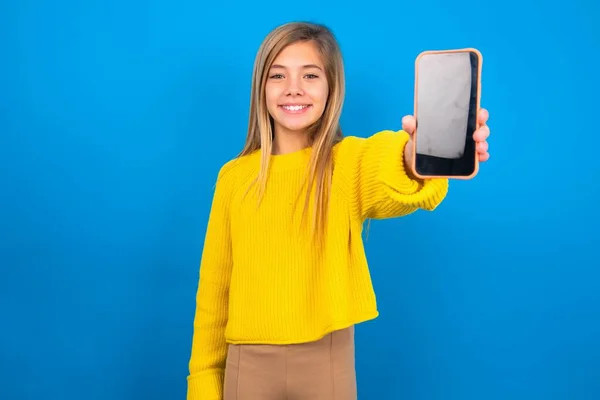 Charming Adorable Caucasian Teen Girl Wearing Yellow Sweater Blue Studio — Stock Photo, Image