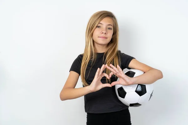 Serieuze Tiener Meisje Dragen Sportkleding Houden Een Voetbal Bal Witte — Stockfoto
