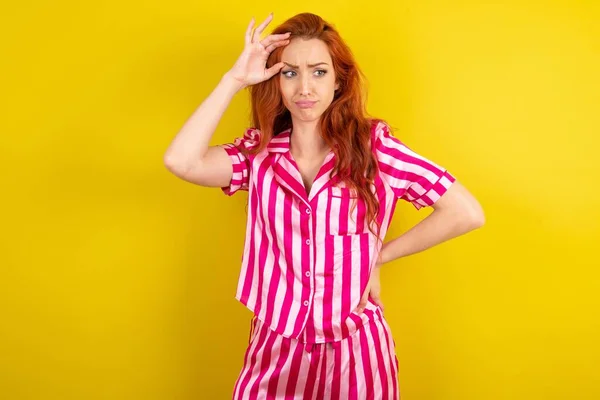 Young Red Haired Woman Wearing Pink Pyjama Yellow Studio Background — Stock Photo, Image