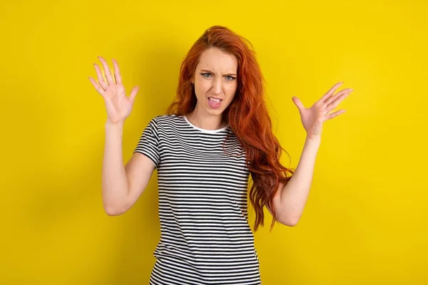 Crazy Outraged Red Haired Woman Wearing Striped Shirt Yellow Studio — Stock Photo, Image