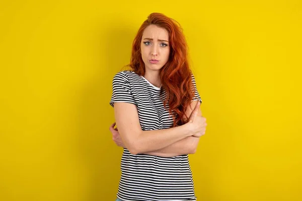 Red Haired Woman Wearing Striped Shirt Yellow Studio Background Shaking — Stock Photo, Image