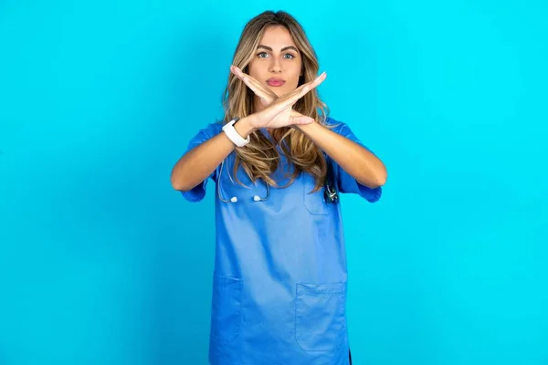 Beautiful Doctor Woman Standing Blue Studio Background Rejection Expression Crossing — Stock Photo, Image