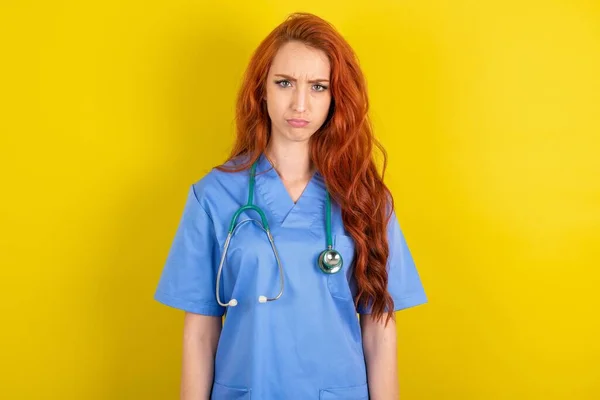 Offended Young Red Haired Doctor Woman Moody Displeased Expression Camera — Stock Photo, Image