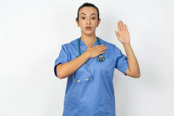 Arab Doctor Woman Wearing Blue Uniform Swearing Hand Chest Open — Stock Photo, Image