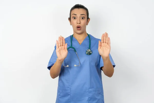 Arab Doctor Woman Wearing Blue Uniform Moving Away Hands Palms — Stock Photo, Image