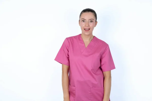 Caucasian Woman Doctor Pink Uniform Having Stunned Shocked Look Mouth — Stock Photo, Image
