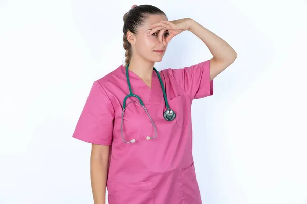 Displeased Caucasian Female Doctor Plugs Nose Smells Something Stink Unpleasant — Stock Photo, Image