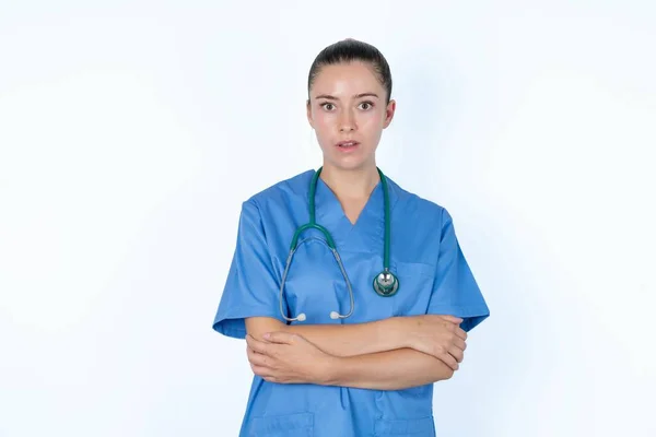 Shocked Embarrassed Caucasian Female Doctor Keeps Mouth Widely Opened Hears — Stock Photo, Image