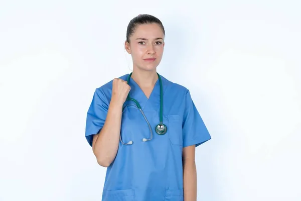 Caucasian Woman Doctor Uniform Stethoscope Shows Fist Has Annoyed Face — Stock Photo, Image