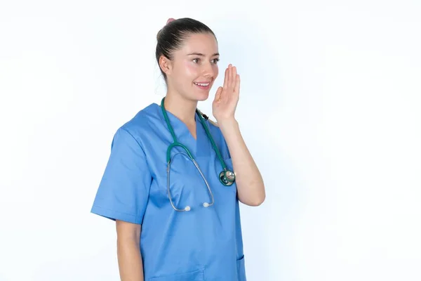 Caucasian Woman Doctor Uniform Stethoscope Look Empty Space Holding Hand — Stock Photo, Image