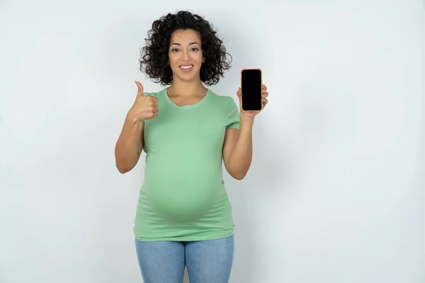 Pregnant Woman Shows Blank Screen Smartphone Thumb Recommend New App — Stock Photo, Image