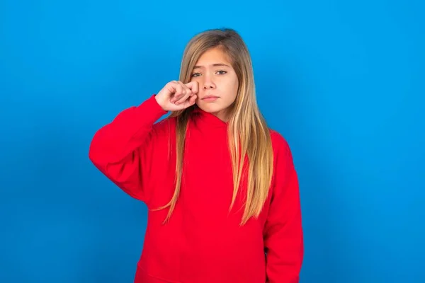Unhappy Beautiful Caucasian Teen Girl Wearing Red Sweater Blue Wall — Stock Photo, Image