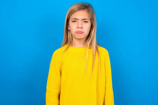 Offended Dissatisfied Beautiful Blonde Teen Girl Wearing Yellow Sweater Blue — Stock Photo, Image