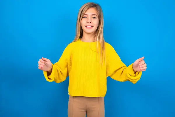Happy Beautiful Blonde Teen Girl Wearing Yellow Sweater Blue Wall — Stock Photo, Image
