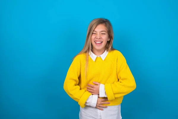 Caucasian Teen Girl Wearing Yellow Sweater Blue Wall Smiling Laughing — Stock Photo, Image