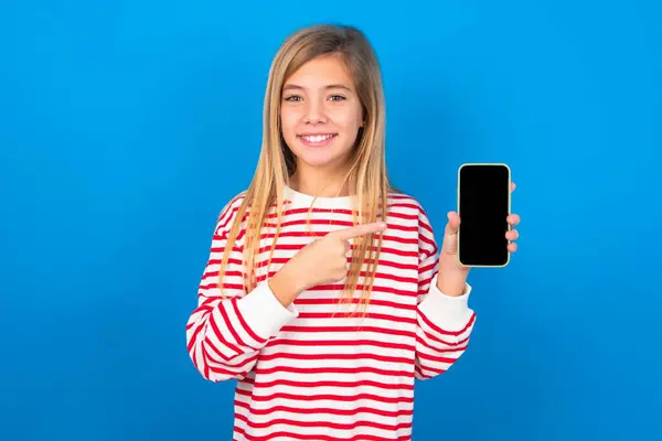 Smiling Blonde Teen Girl Wearing Striped Shirt Blue Wall Mock — Stock Photo, Image