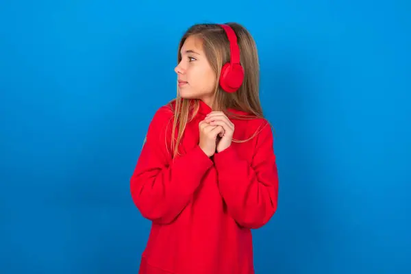 Blonde Teen Girl Wearing Red Sweater Blue Wall Wears Stereo — Stock Photo, Image