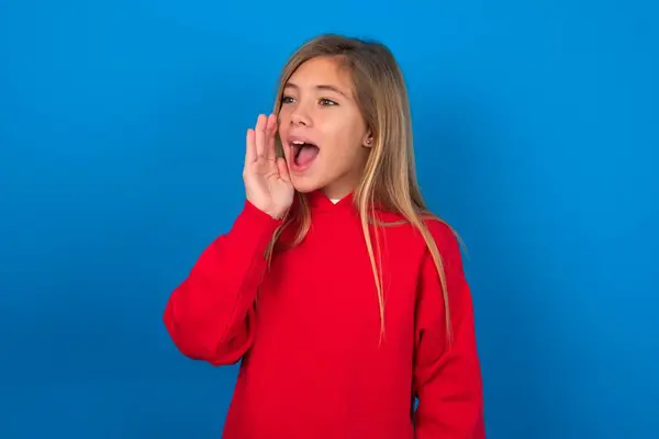 Blonde Teen Girl Wearing Red Sweater Blue Wall Look Empty — Stock Photo, Image