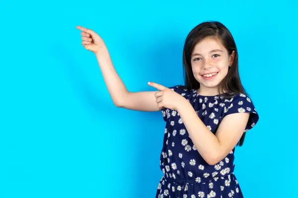Beautiful Kid Girl Wearing Dress Blue Background Indicating Finger Empty — Stock Photo, Image