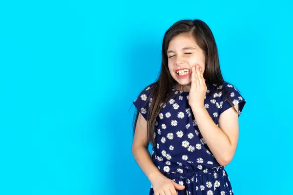 Beautiful Kid Girl Wearing Dress Blue Background Touching Mouth Hand — Stock Photo, Image