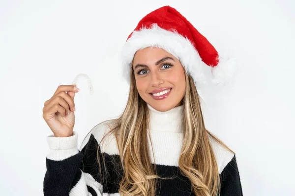 Young Caucasian Woman Wearing Santa Hat Striped Sweater White Studio — Stock Photo, Image