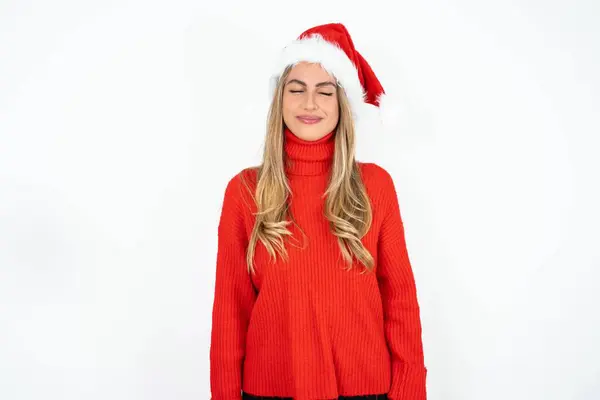 Young Caucasian Woman Wearing Santa Hat Red Sweater White Studio — Stock Photo, Image