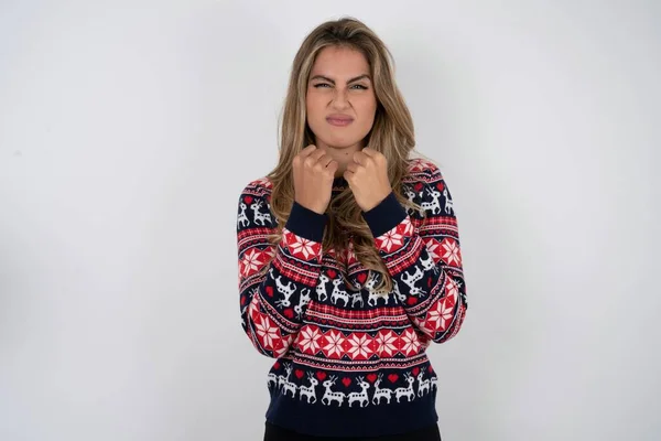 Displeased Annoyed Caucasian Woman Wearing Christmas Sweater Clenches Fists Gestures — Stock Photo, Image