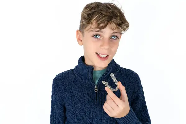 Handsome Caucasian Teenager Boy White Studio Background Holding Invisible Aligner — Stock Photo, Image