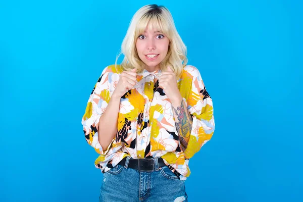 Portrait Desperate Shocked Caucasian Girl Wearing Floral Shirt Isolated Blue — Stock Photo, Image