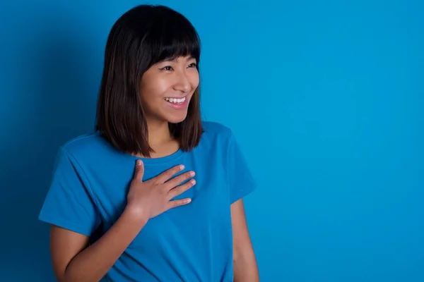 Joyful Young Asian Woman Wearing Blue Shirt Blue Background Expresses — Stock Photo, Image