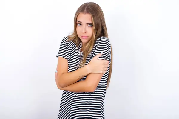 Beautiful Blonde Girl Wearing Striped Shirt White Background Shaking Freezing — Stock Photo, Image