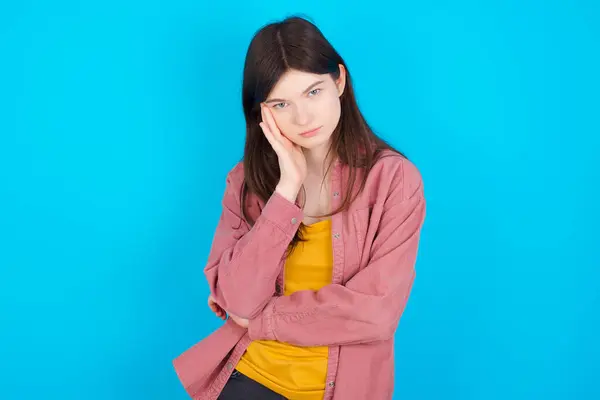 Very Bored Young Caucasian Girl Wearing Pink Shirt Isolated Blue — Stock Photo, Image