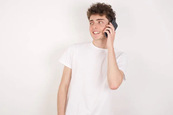Pleasant Looking Happy Handsome Young Man Has Nice Telephone Conversation — Stock Photo, Image