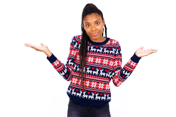 Puzzled Clueless African American Woman Wearing Christmas Sweater White Wall — Stock Photo, Image