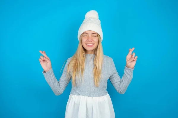 Beautiful Kid Girl Wearing White Knitted Hat Blue Sweater Has — Stock Photo, Image