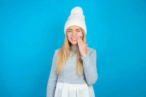 Beautiful Kid Girl Wearing White Knitted Hat Blue Sweater Touching — Stock Photo, Image