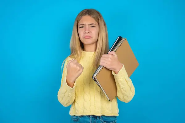 Displeased Annoyed Beautiful Kid Girl Wearing Yellow Sweater Blue Background — Stockfoto