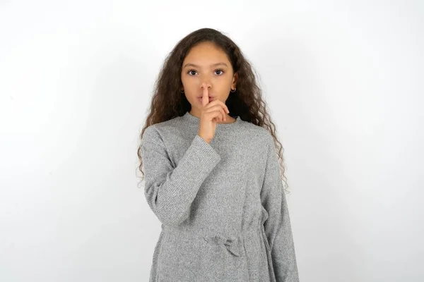 Teenager Girl Wearing Grey Dress White Background Makes Silence Gesture — Stock Photo, Image