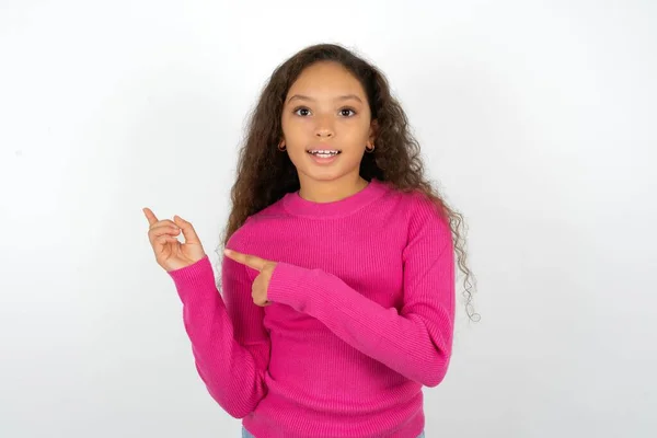 Teenager Girl Wearing Pink Sweater Points Copy Space Indicates Advertising — Stock Photo, Image