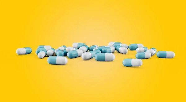 Μπλε Και Άσπρες Φαρμακευτικές Αντιβιοτικές Κάψουλες Που Απομονώνονται Κίτρινο Φόντο — Φωτογραφία Αρχείου