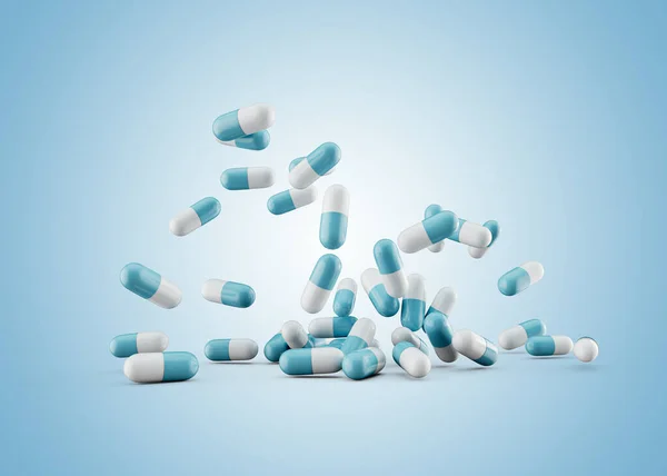 Μπλε Και Άσπρες Φαρμακευτικές Αντιβιοτικές Κάψουλες Που Πέφτουν Μαλακό Μπλε — Φωτογραφία Αρχείου